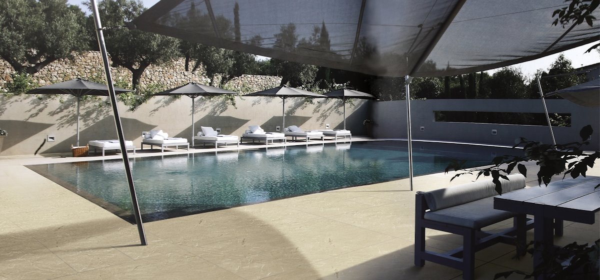 Oasis Stone Foge - realization of flooring around bazin.jpg